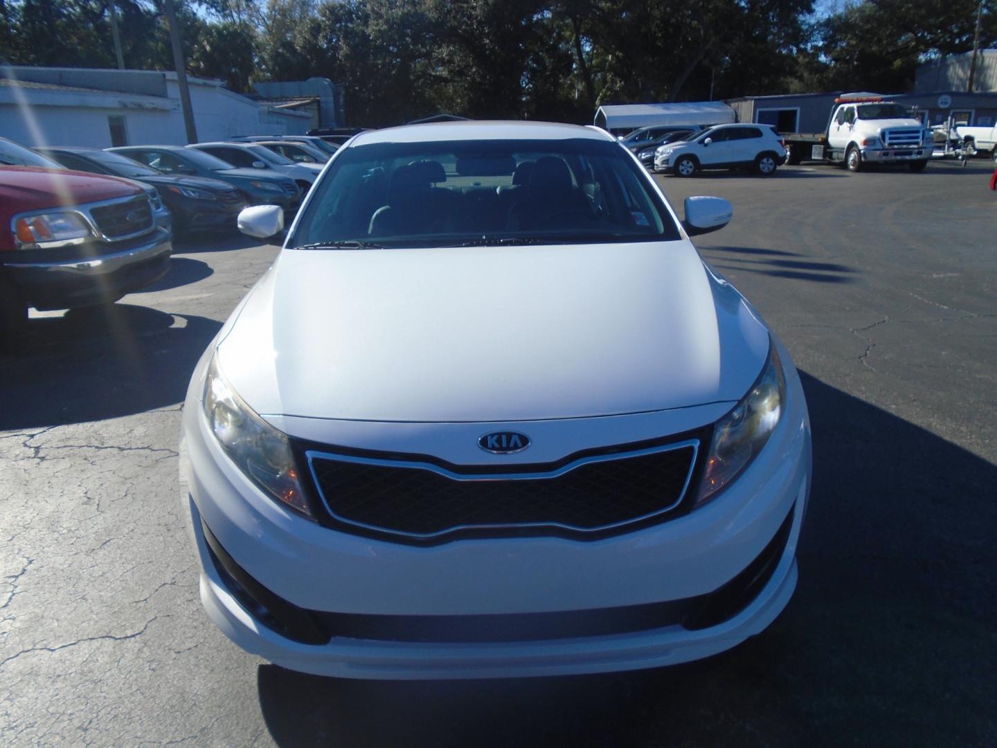 2012 Kia Optima (5XXGR4A62CG) , located at 6112 N Florida Avenue, Tampa, FL, 33604, (888) 521-5131, 27.954929, -82.459534 - Photo#1